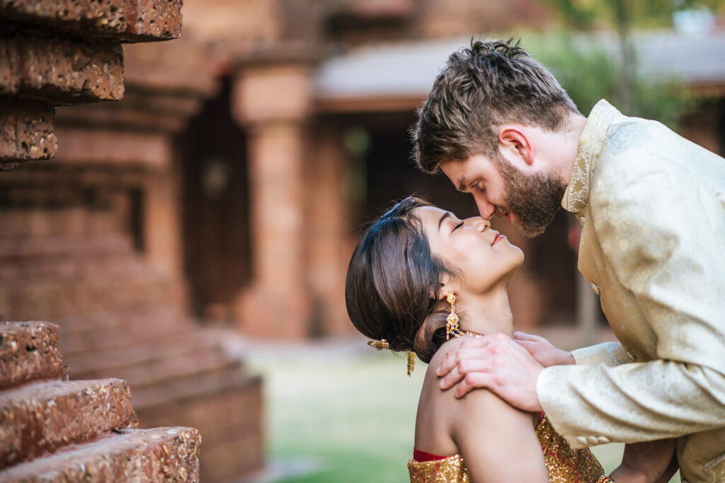 Mengabadikan Momen Indah dengan Fotografer Wedding Bogor yang Profesional asian bride caucasian groom have romantic time with thailand dress 4