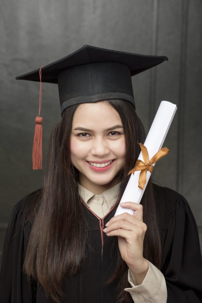 Temukan Fotografer Wisuda Jakarta Terbaik untuk Memotret Kenangan Anda portrait young woman graduation gown smiling cheering black background 5