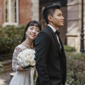 Mengabadikan Momen Indah Anda Dengan Jasa Foto Prewedding Bogor Profesional dan Berkualitas side view bride standing groom while holding bouquet